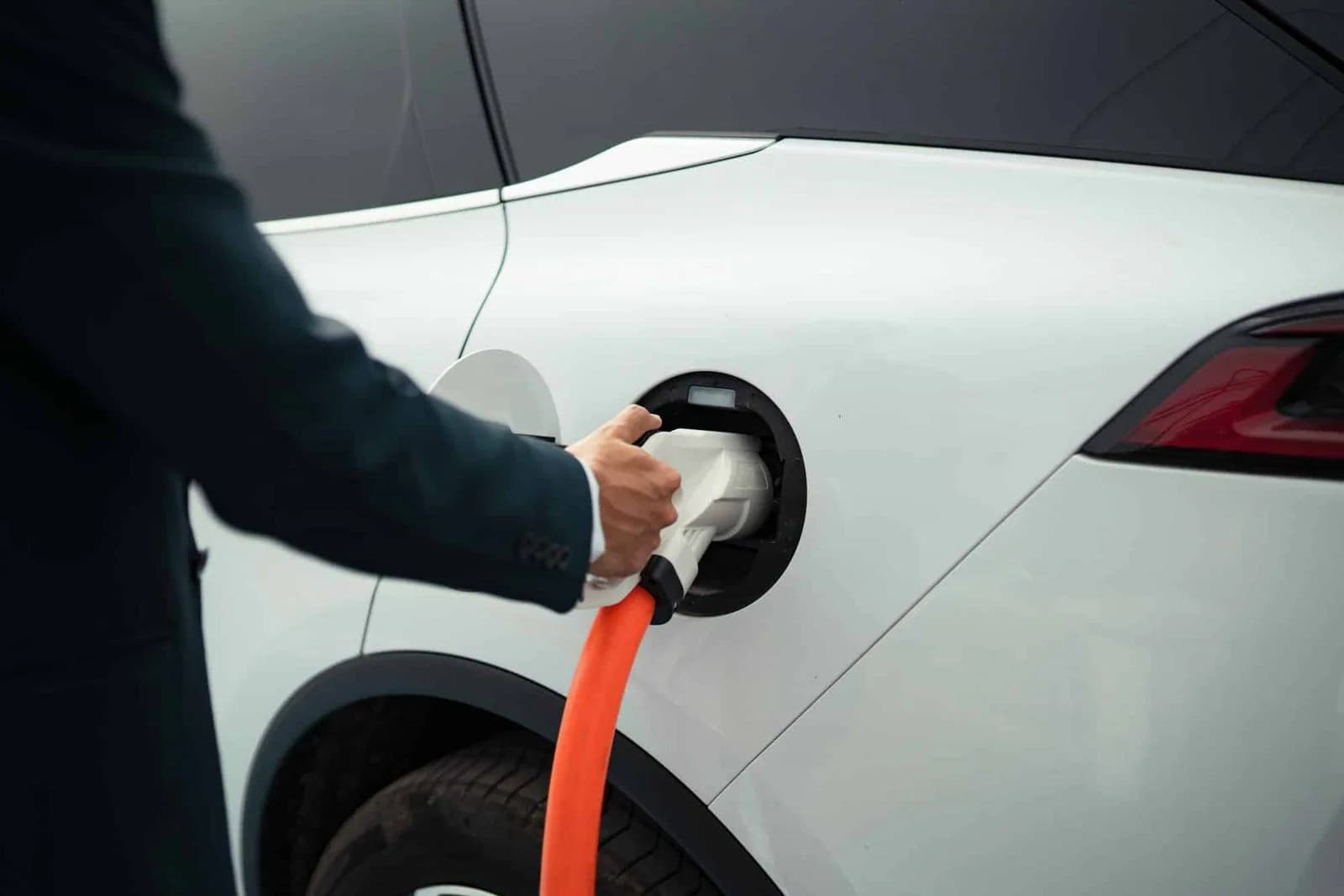 Electric vehicle connected to a charging cable