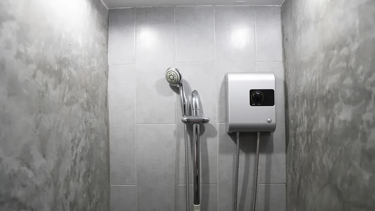 Electric shower in a tiled bathroom